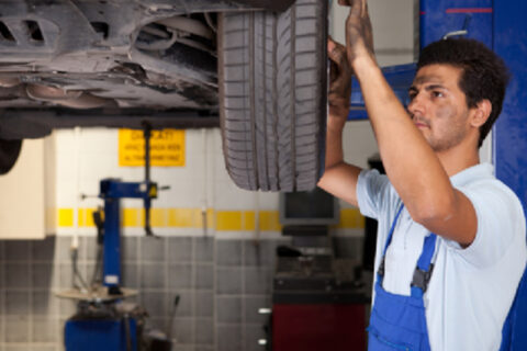 mechanic fixing tyre