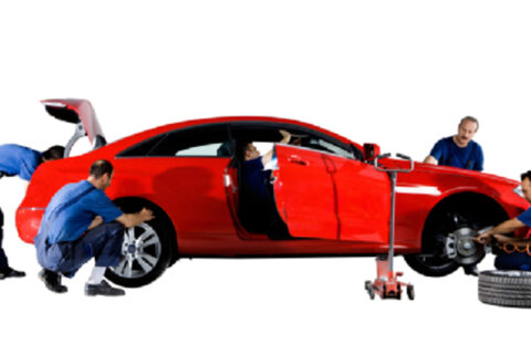 multiple mechanics fixing car