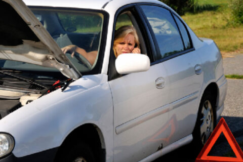 woman car got stuck in middle of road