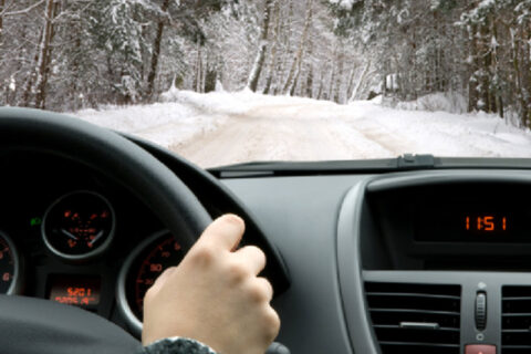 driving car on snowy road