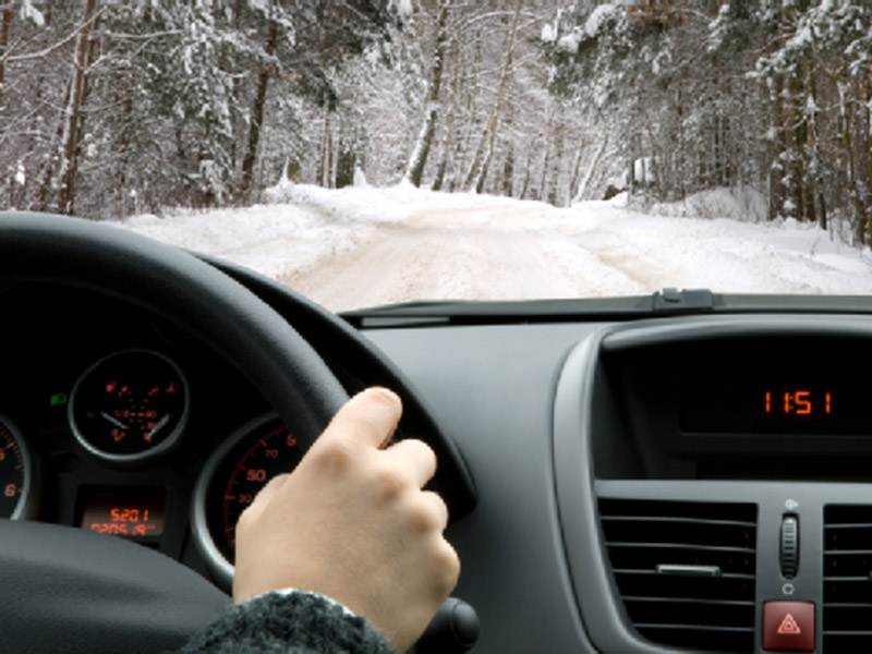 driving car on snowy road