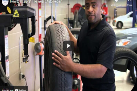 Man rolling the tyre