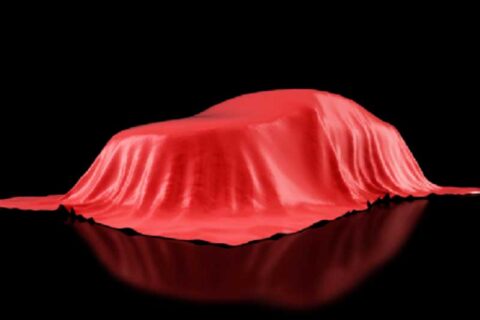 a car covered with a red cloth