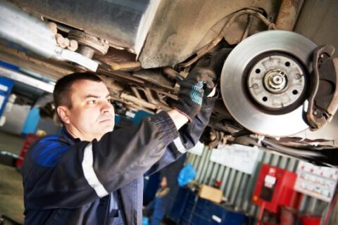 man fitting some brake