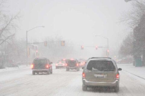 cars moving on a snowy road