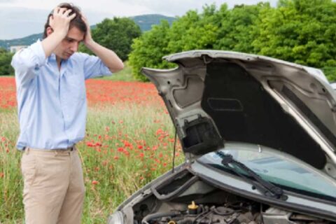 frustated reaction of man as his car broke down