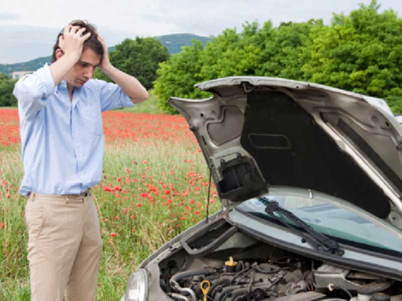 frustated reaction of man as his car broke down