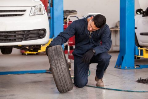 Tire rotating by a man